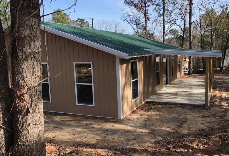 A Quality Pole Building brown with green roof | Gilbert, SC